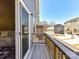Balcony features wood railings and a view of the street and nearby buildings at 2610 Greenmarket Dr, Charlotte, NC 28217