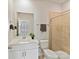 Bathroom features a modern vanity, a walk-in shower with elegant tile, and a well-lit mirror at 2610 Greenmarket Dr, Charlotte, NC 28217