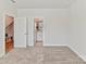 Spacious bedroom with ensuite bathroom and walk-in closet for added convenience and privacy at 2610 Greenmarket Dr, Charlotte, NC 28217