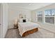 Comfortable bedroom with a queen-sized bed, a plush rug, and two windows providing natural light at 2610 Greenmarket Dr, Charlotte, NC 28217