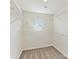 Walk-in closet featuring adjustable wire shelving, carpet, and a window at 2610 Greenmarket Dr, Charlotte, NC 28217