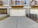 Attached garage with a driveway, providing convenient parking at 2610 Greenmarket Dr, Charlotte, NC 28217