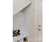 Inviting mudroom featuring coat hooks, bench seating, and storage for an organized transition into the home at 2610 Greenmarket Dr, Charlotte, NC 28217