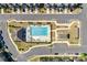 Birds eye view of community pool with sunning deck, lounge chairs and covered pavilion among townhomes at 2635 Winter Thistle Way, Indian Land, SC 29707