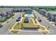 Street aerial view of townhome community with community mailboxes, pavilion, and pool for residents at 2635 Winter Thistle Way, Indian Land, SC 29707