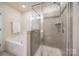 A bathroom featuring both a bathtub and a separate shower at 2635 Winter Thistle Way, Indian Land, SC 29707