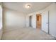 Unfurnished bedroom with carpet, walk-in closet and two doors at 2635 Winter Thistle Way, Indian Land, SC 29707