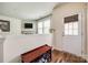 Inviting entryway with shoe storage, and a view into the living area at 2635 Winter Thistle Way, Indian Land, SC 29707