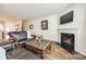 Comfortable living room with fireplace at 2635 Winter Thistle Way, Indian Land, SC 29707