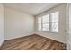 Office with hardwood floors, a large window with bright light and neutral walls at 2635 Winter Thistle Way, Indian Land, SC 29707