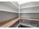 Spacious pantry with white shelves and wooden countertops, offering ample storage space at 302 Lincoln St, Belmont, NC 28012