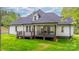 View of home featuring a wooden deck, perfect for outdoor relaxation and entertaining at 3732 Whitney Ne Dr, Hickory, NC 28601