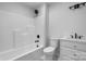 Bathroom featuring shower and tub combo, sleek fixtures, and contemporary design at 3732 Whitney Ne Dr, Hickory, NC 28601