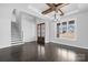 Bright dining room features hardwood floors, modern lighting, and a view of the outdoors at 3732 Whitney Ne Dr, Hickory, NC 28601