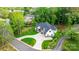 Stunning home with a circular driveway, lush landscaping, and inviting entrance at 3732 Whitney Ne Dr, Hickory, NC 28601