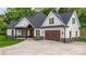 Well-maintained exterior featuring white siding, stone accents, and a dark shingled roof at 3732 Whitney Ne Dr, Hickory, NC 28601