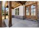 A luxurious wood double door is accentuated by stone and post columns at 3732 Whitney Ne Dr, Hickory, NC 28601