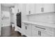 Modern kitchen showcasing white cabinetry, stainless steel appliances, and stylish countertops at 3732 Whitney Ne Dr, Hickory, NC 28601