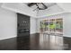 Spacious living room has a modern fireplace, hardwood floors and sliding glass doors at 3732 Whitney Ne Dr, Hickory, NC 28601