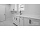 The mudroom features white cabinets, modern fixtures, and a sink at 3732 Whitney Ne Dr, Hickory, NC 28601