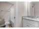 Bright bathroom featuring a granite countertop vanity and tiled shower-tub combo at 3931 Newhall Nw Dr, Hickory, NC 28601