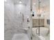 Elegant bathroom featuring a glass enclosed shower with a built-in seat and soaking tub at 4354 Persimmon Rd, Lancaster, SC 29720