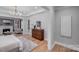 Spacious bedroom featuring hardwood floors, sitting area, and wood dresser at 4354 Persimmon Rd, Lancaster, SC 29720