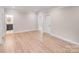 Spacious bedroom with light hardwood floors and neutral paint, ready for personalization at 4354 Persimmon Rd, Lancaster, SC 29720