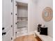 Hallway featuring hardwood floors, decor and a laundry room through a doorway at 4354 Persimmon Rd, Lancaster, SC 29720