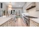 Modern kitchen features a large island, stainless appliances, and a view to the back deck at 4354 Persimmon Rd, Lancaster, SC 29720