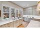 Bright kitchen features quartz countertops and views to nature with ample windows at 4354 Persimmon Rd, Lancaster, SC 29720