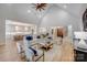 Spacious living room featuring an open concept, vaulted ceiling, hardwood floors, and flows into the kitchen at 4354 Persimmon Rd, Lancaster, SC 29720