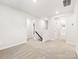 Bright upstairs hallway with carpet, leading to various rooms at 5013 Poplin Vly, Cherryville, NC 28021