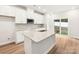 Modern kitchen with an island, granite countertops, and stainless steel appliances at 5013 Poplin Vly, Cherryville, NC 28021