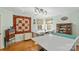 Bright craft room featuring hardwood floors, natural light, and ample workspace at 5053 Marci Ln, Belmont, NC 28012