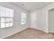 Bedroom with natural light from the two large windows at 508 Hawley St, Charlotte, NC 28214