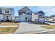 Charming two-story home featuring a spacious driveway, attached garage and a well-manicured lawn at 508 Hawley St, Charlotte, NC 28214