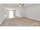 Open-concept living area leading to the kitchen with plenty of natural light at 508 Hawley St, Charlotte, NC 28214
