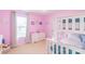 Charming pink bedroom featuring bunk beds, a large window, and plenty of natural light at 552 Montgomery Dr, Rock Hill, SC 29732