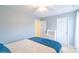 Cozy bedroom featuring a ceiling fan, neutral walls, and comfortable-looking bed at 552 Montgomery Dr, Rock Hill, SC 29732