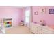 Bright pink bedroom with dresser, bookcase and decorations, perfect for a  at 552 Montgomery Dr, Rock Hill, SC 29732