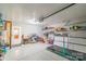 Well-organized garage featuring epoxy flooring, storage shelves, and ample space for vehicles and household items at 552 Montgomery Dr, Rock Hill, SC 29732