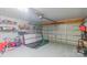Functional garage space with an epoxy floor, storage racks, and ample room for organizing tools and equipment at 552 Montgomery Dr, Rock Hill, SC 29732