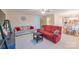 Inviting living room featuring two sofas, a ceiling fan, and an open view into the kitchen and dining area at 552 Montgomery Dr, Rock Hill, SC 29732