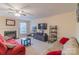 Cozy living room with a fireplace, comfortable seating, and a ceiling fan at 552 Montgomery Dr, Rock Hill, SC 29732