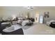 Stylishly staged main bedroom highlighting neutral tones, updated furnishings, and ensuite access at 552 Montgomery Dr, Rock Hill, SC 29732