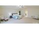 Spacious main bedroom featuring a ceiling fan, a sitting area, and ensuite access at 552 Montgomery Dr, Rock Hill, SC 29732