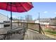 Outdoor patio area featuring a table and chairs, with views of the fenced backyard at 7217 Kenyon Dr, Denver, NC 28037