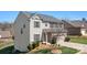 A charming two-story home with vinyl siding and a well-maintained front yard at 7217 Kenyon Dr, Denver, NC 28037