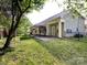 Backyard with patio and partially covered back porch at 8830 Beaver Creek Dr, Charlotte, NC 28269